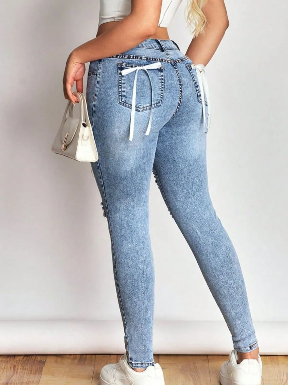 Distressed Skinny Jeans with Bow Back 