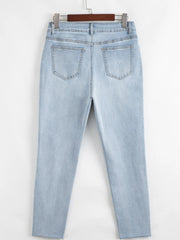 Mid Rise Ankle-Length Distressed Skinny Jeans 