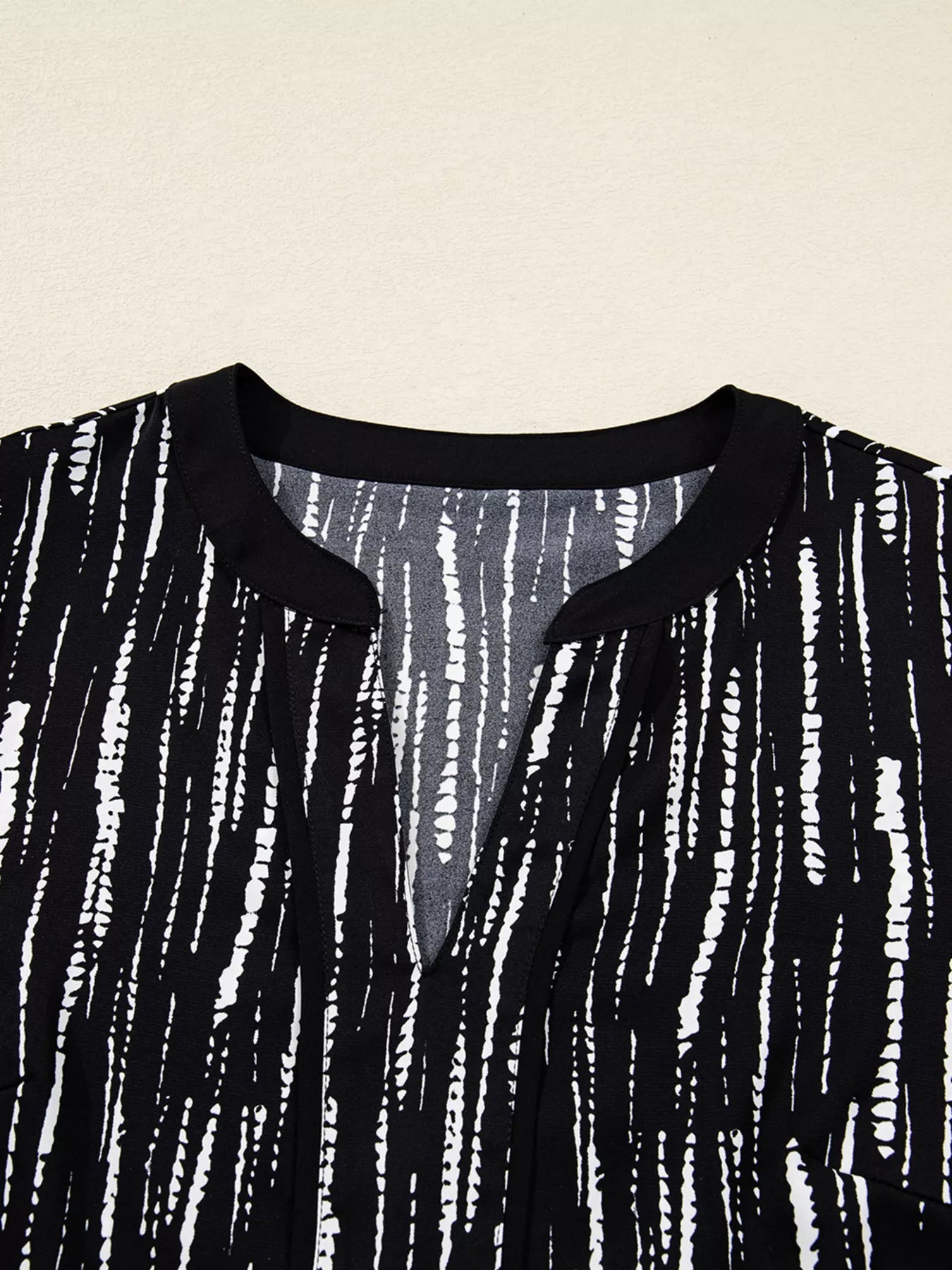 Abstract Printed Notched Long Sleeve Blouse 