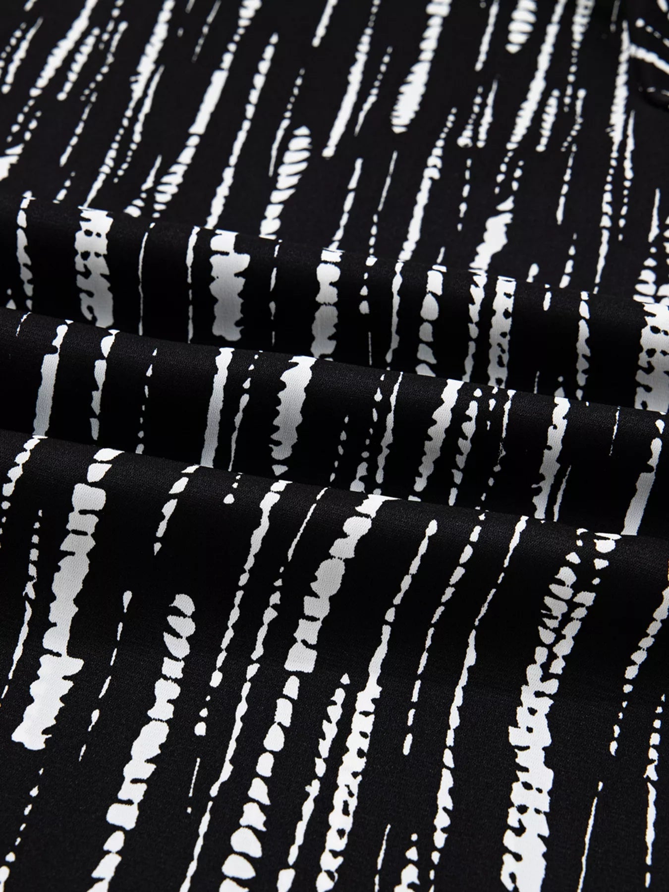 Abstract Printed Notched Long Sleeve Blouse 