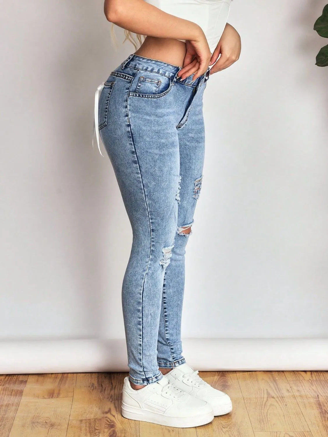 Distressed Skinny Jeans with Bow Back 