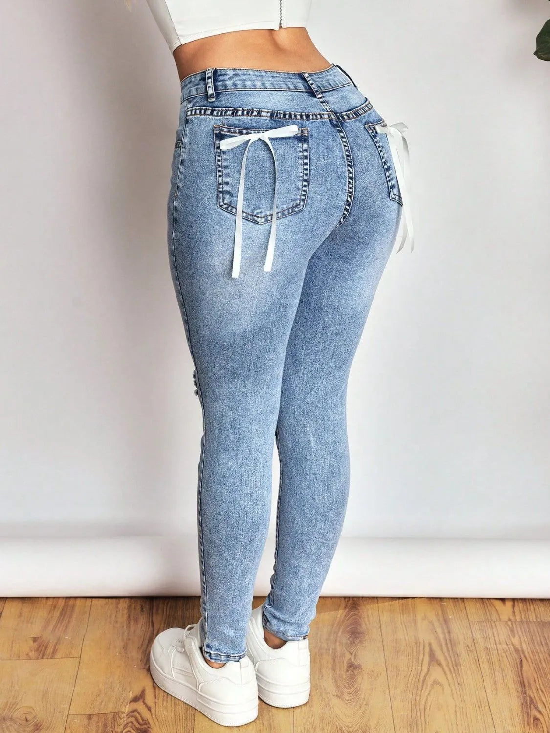 Distressed Skinny Jeans with Bow Back 