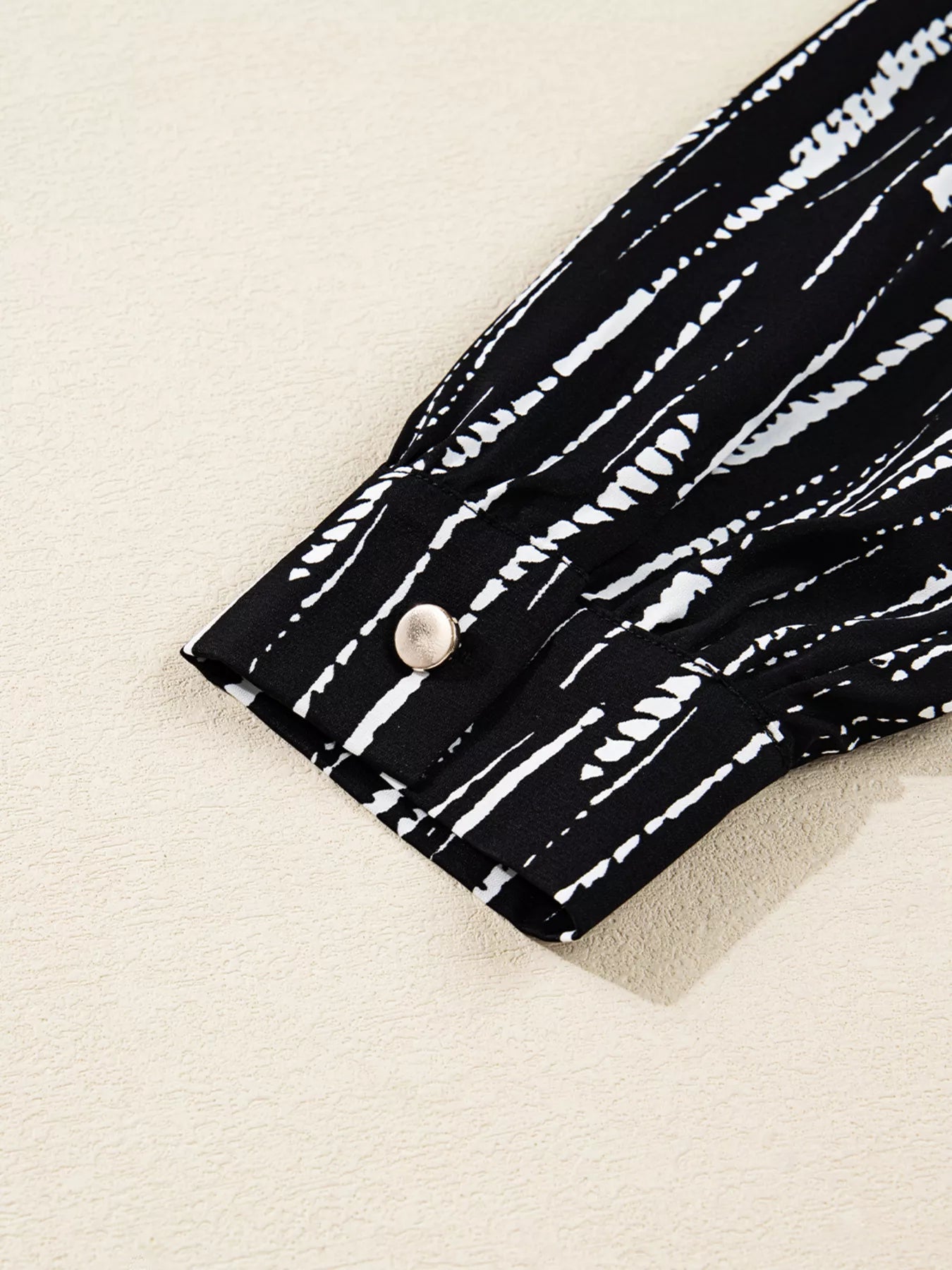Abstract Printed Notched Long Sleeve Blouse 