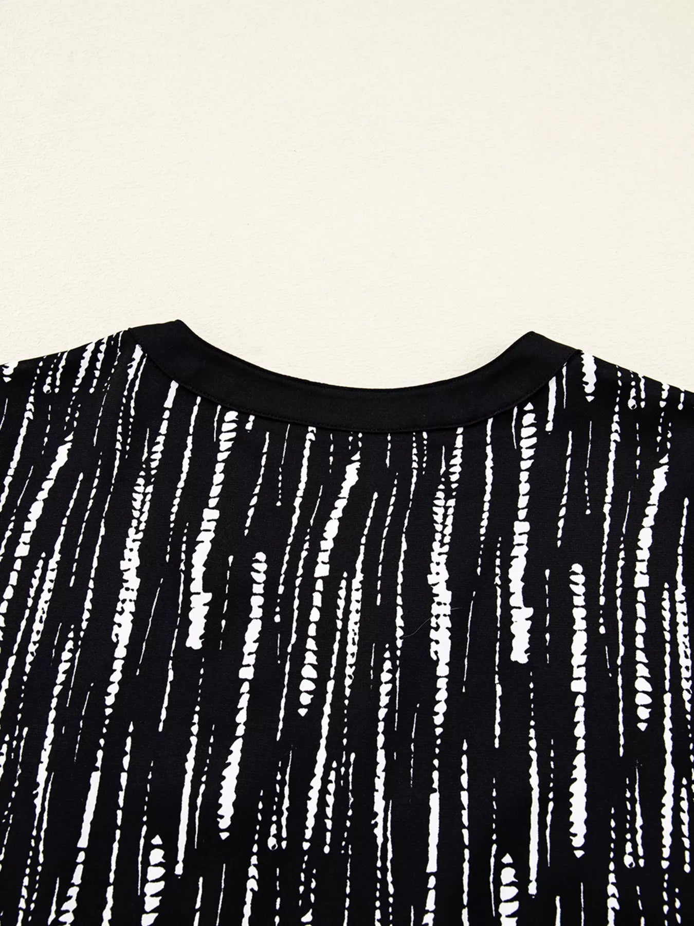 Abstract Printed Notched Long Sleeve Blouse 