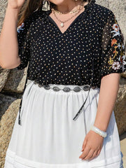 Plus Size Printed Tie Neck Half Sleeve Blouse 