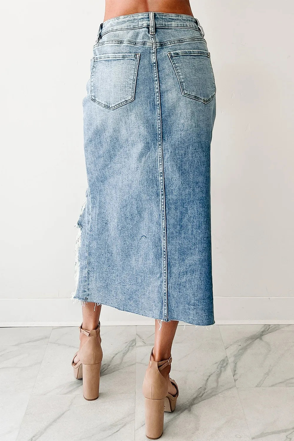 Distressed Asymmetrical Denim Skirt with Frayed Hem 